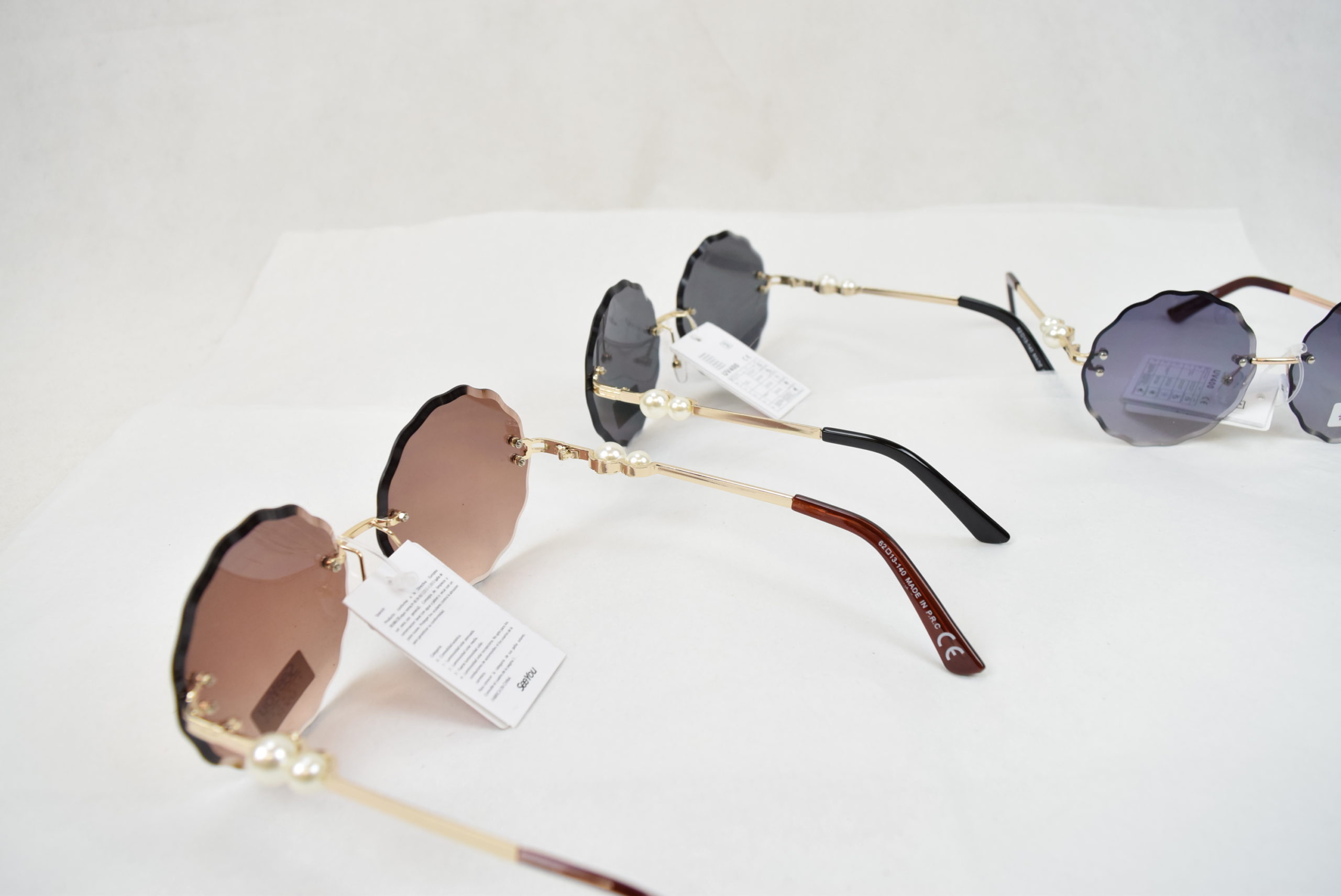 Lunette de Soleil Femme Forme fleur (x12) - Grossiste en ligne